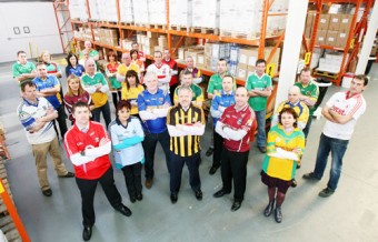 Pictured in the photograph are Kevin Collins, managing director of Western Hygiene Supplies Ltd  and DJ Carey, alongside the WHSL team in county GAA colours, representing the fact that the company now distributes nationally.