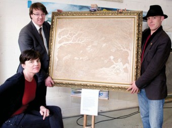 Setting up the exhibition were (from l to r) Labour councillor Niall McNelis, Margaret Nolan, and artist Jeremiah O’Dea.