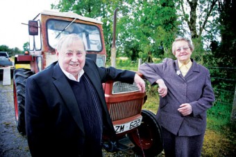 Pa and Bridget Crehan with their 1973 vintage Universal tractor at a photocall to announce details of the Mountbellew Vintage Rally which takes place at Mountbellew Mart on Saturday and Sunday. Photo:-Mike Shaughnessy