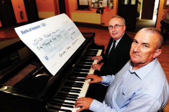 Michael O'Hare, chairman of the Galway Choral Association and Stephen O'Sullivan, national secretary of the Irish Kidney Association pictured at the presentation of a cheque for €1,000 to the Irish Kidney Association  raised by The Galway Choral Association.
