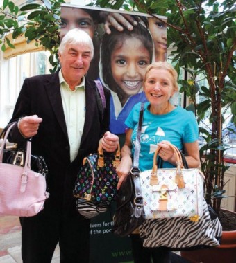 John O Shea , CEO of GOAL, and Maura Lennon , GOAL representative in the west of Ireland, displaying some of the handbags which will be on sale in the Twelve Hotel in Barna on Thursday September 22.