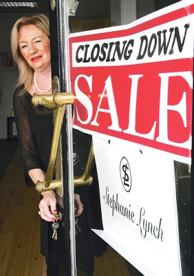 Stephanie Lynch pictured shutting the doors for the last time at her eponymous Eyre Square boutique. Photo: Mike Shaughnessy