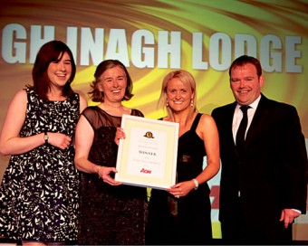 Lough Inagh’s Sorcha O’Connor, Maire O’Connor and Dominic O’Morain receive the gold award from Clare McKenna, financial director of sponsor Aon, at the 23rd annual Hotel & Catering Review Gold Medal Awards.