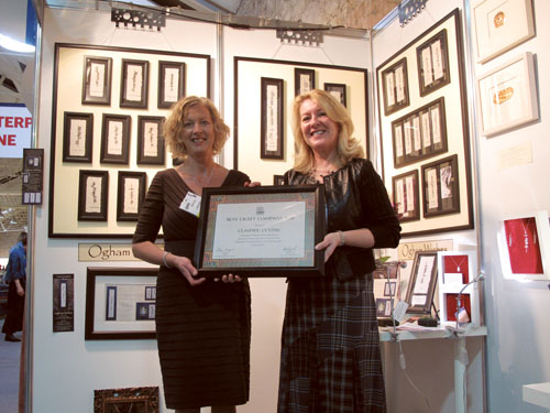 Ethel Kelly of The Claypipe Visitor Centre in Knockcroghery, Co Roscommon being presented with The Best Irish Craft Company 2011 Award from Ms Anne Tarrant, executive director of The North American Celtic Trade Association (NACTA), at Showcase 2012.