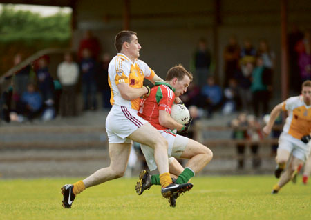 Doran Harte is tackled from behind during Garryclastle’s win over Killucan last weekend. Photo: johnobrienimages.com