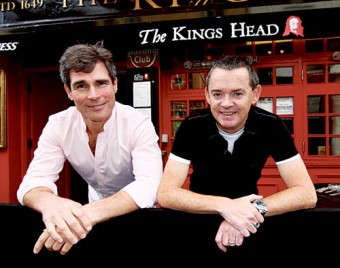 Liam Cullinane, who needs a new tricycle, with Paul Grealish of the King’s Head. The King’s Head Bar on High Street will host a quiz next Monday night to help raise funds.  Photo:-Mike Shaughnessy