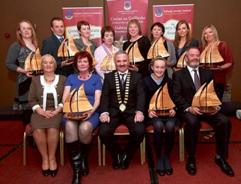 Pictured at the awards were (back l-r) Eileen Edwards from Boystown Heritage Store in Ballymoe, Community Enterprise winner, Joe Hansberry from Athenry Community Games, Sports Award winner, Pauline Scott from ‘Glinsk 100’, Heritage Publication winner, Anna Casey from Gort Community School, Environmental Award winner, Ann O’Shaughnessy from Clann Family Resource Centre in Oughterard, Intergenerational Award winner, Síle Griffin from Clifden 2012 Committee, Best Contribution to Heritage winner, Alma King from Electronics Concepts Ltd in Oughterard, Corporate Social Responsibility Award winner, Rachel Cunniffe from the Dolman Centre in Kinvara, Social Inclusion Award winner, Leona Larkin from St Augustine's National School in Clontuskert, Schools Contribution to Heritage winner. (seated l-r) county manager, Martina Moloney,  Noelle Lynskey from Portumna Arts Group, Arts and Culture winner, County Mayor Thomas Welby and his wife Bernie Welby, and John Martin Griffin, Volunteer of the Year winner.  Photo:-Mike Shaughnessy