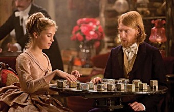 A game of love: Kitty (Alicia Vikander) and Levin (Domhnall Gleeson) spell out their love in a party game in Anna Karenina.