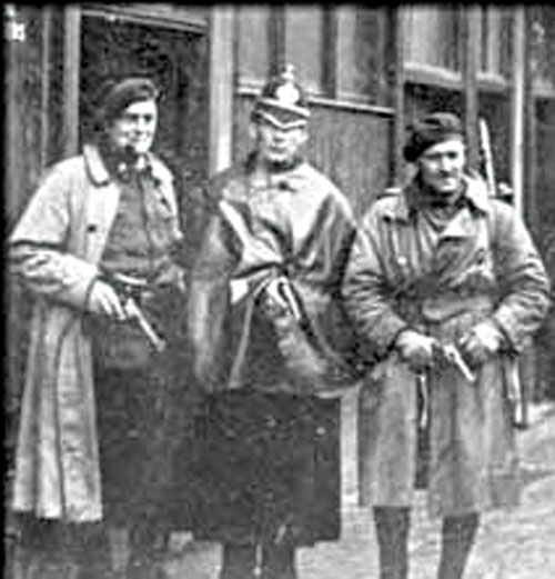 A dangerous job: An RIC constable with two Black and Tans during the War of Independence.