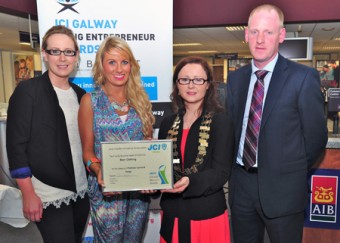The proud winners from Born collect their two awards — Liz Neylon and Emma Regan from Born receive their awards from Olivia Hayes, president of the JCI Galway, also in photo is Seamus Fenessey - the branch manager for AIB.