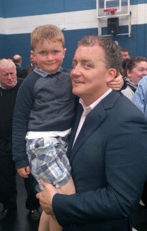 FF Cllr Ollie Crowe pictured with his son Luke at the count centre in Westside on Sunday. Photo:- Kernan Andrews