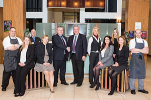 Pat McDonagh, owner of the Loughrea Hotel &amp; Spa, with new general manager Noel Mulhaire and members of staff at the announcement of a  &euro;1m refurbishment. 