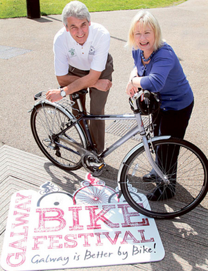 Mick Curley of Galway Sports Partnership with Helena Martyn of Galway City Council at the launch of Galway City Council's Galway Bike Festival. 
					Photo:- Mike Shaughnessy 