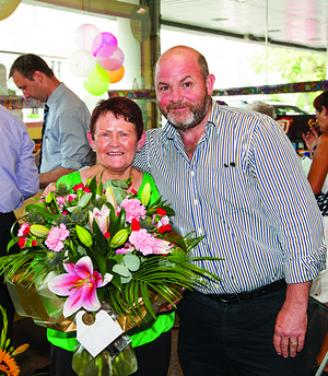 Ann Folan celebrates retiring from Nestor&rsquo;s SuperValu, Fr Griffin Road, branch after 26 years, pictured with director Tom Nestor. Photo: Reg Gordon