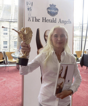 West of Ireland artist Olwen Fou&eacute;r&eacute; with the The Herald Archangel Award, for her performance in riverrun - a Galway Arts Festival production.