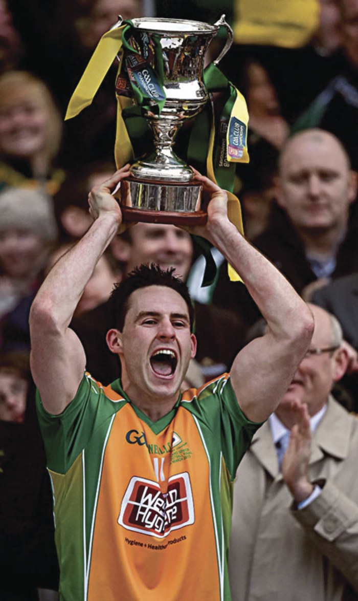 That winning feeling: Corofin captain Michael Farragher with the Andy Merrigan Cup.
