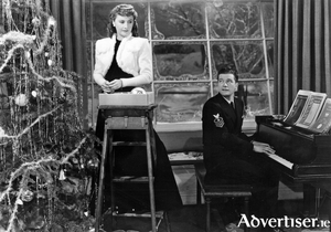 Barbara Stanwyck and Dennis Morgan in Christmas In Connecticut.