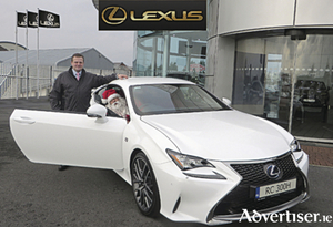 Even Santa Claus has a Christmas list.  Enda Brennan, Lexus sales manager makes his dream come through with the new Lexus RC 300 Sports coupe.