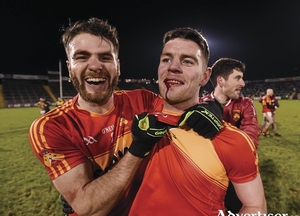 Blood and glory: Ger McDonagh and Aidan Walsh celebrate at full time. Photo: Sportsfile 