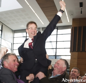 Eamon &Oacute;&nbsp;Cu&iacute;v celebrating his re-election at Election 2016. Photo:- Mike Shaughnessy
