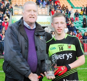 Man of the match: Belmullet&#039;s Ryan O&#039;Donoghue accepts his man of the match award. Photo: Leitrim Observer 