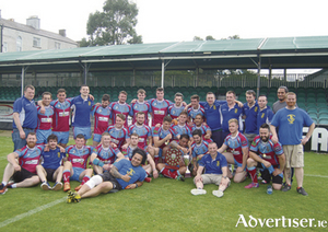 Galway Tribesmen celebrate winning the All Ireland Rugby League Championship crown.