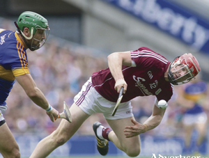 Galway&#039;s Joe Canning and Tipperary&#039;s James Barry in action from the at the  GAA Hurling All - Ireland semi-final at Croke Park on Sunday. Photo:-Mike Shaughnessy