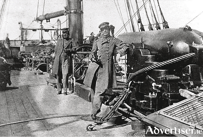 Captain Raphael Semmes, Alabama&rsquo;s commanding officer, standing by his ship&rsquo;s 8-inch bore gun, which brought havoc to the Union navy.
