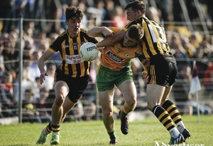 11 October 2015; Liam Silke, Corofin, is tackled by Cathal Kenny, right, and Michael Daly, left, Mountbellew-Moylough. Galway County Senior Football Championship Final, Mountbellew/Moylough v Corofin. Tuam Stadium, Tuam, Co. Galway. Picture credit: Sam Barnes / SPORTSFILE