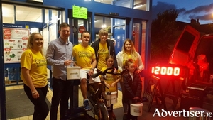 Lidil Store Manager Hugh Hester and Barrestown Buddy Lee Barrett on the 12th hour of their Barretstown Spinathon with Lidl staff at Lidl (Bury Street).  A special thanks to all of their loyal customers who helped us raise a fantastic &euro;1,400 and the Ballina Community Sports Centre for loan of the spin bike.