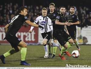  Daryl Horgan of Dundalk in action against Galway United players, from left, Armin Aganovic, Conor Melody, Stephen Folan and Alex Byrne