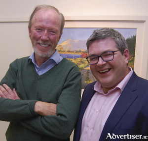 Artist Paul Guilfoyle and Pat McGrath, Western Correspondent RT&Eacute;, at the recent launch of Paul&#039;s exhibition in the Kenny Gallery.