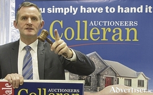 Auctioneer Don Colleran.