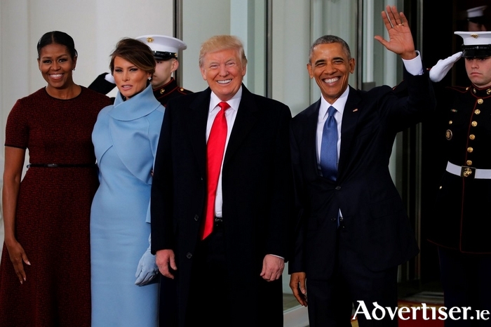 Michelle Obama, Melania Trump, Donald Trump, and Barack Obama.