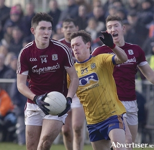 Galway&#039;s Barry McHugh, who has enjoyed an impressive campaign at full forward,  and Roscommon&#039;s Conor Devaney in the FBD Connacht Football League final in Kiltoom on Sunday. 		Photo:-Mike Shaughnessy