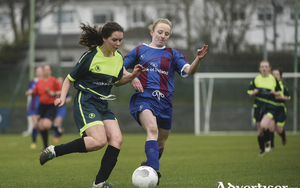 Leah Moran, left, of Sacred Heart Westport in action against Eadaoin Lyons of Col&aacute;iste na Tr&oacute;caire Rathkeale during the Bank of Ireland FAI Schools Senior Girls National Cup Final. Photo: Sportsfile