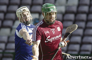 Cian Taylor of Laois fails to stop Galway&#039;s David Burke in action from the Allianz Hurling 
League game at Pearse Stadium on Sunday.		Photo:-Mike Shaughnessy