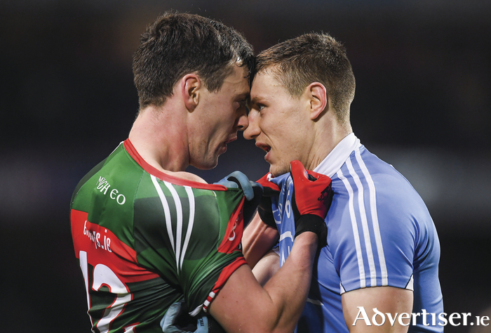 No backing down: Diarmuid O'Connor and John Small getting up close and personal in Croke Park last Saturday night. Photo: Sportsfile. 