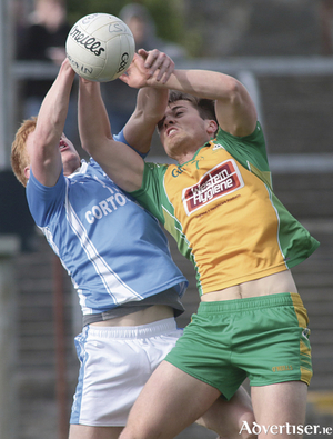 Adrian Varley of Cortoon Shamrocks and Liam Silke Corofin tussle for possession in the Galway County Senior Club Football Championship at Tuam stadium on Sunday. Photo:-Mike Shaughnessy