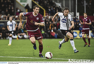 Lee Grace of Galway United in action against David McMillan of Dundalk  at Oriel Park,