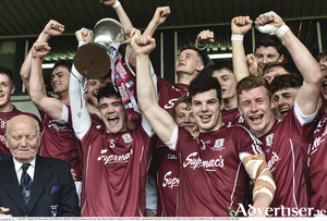 Captain of Galway minors Sean Mulkerrin celebrates with his teammates at the end of the Electric Ireland Connacht GAA Football Minor Championship final between Galway and  Sligo at Pearse Stadium in Salthill, Galway. Photo by David Maher/Sportsfile