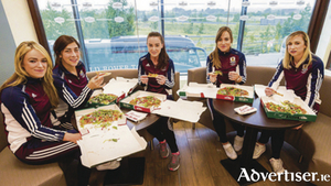 Lorraine Ryan, Jessica Gill, Noreen Coen, Heather Cooney, and Niamh Kilkenny enjoying Papa John&#039;s new pizza range.
