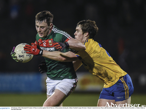Diarmuid O&#039;Connor breaks through the challenge of David Murray in Mayo&#039;s last meeting with Roscommon, in the league in February. Photo: Sportsfile. 