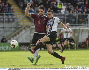 Stephen Folan of Galway United in action against Michael Duffy of Dundalk during the EA Sports Cup semi-final match between Galway United and Dundalk at Eamonn Deacy Park on Monday.