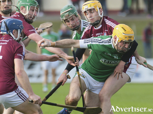 Conor Kavanagh of Liam Mellows is blocked by Clarinbridge&#039;s Ryan Ellis in action from the Galway Senior Hurling Club quarter finals at Kenny Park, Athenry on Sunday. Photo:- Mike Shaughnessy