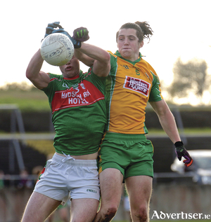 Kieran Molloy of Corofin and Peter Domican of St Brigid&#039;s in action from the Connacht GAA  Club Senior Football championship semi-final at Tuam Stadium on Sunday. Photo:-Mike Shaughnessy