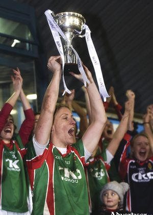 Captain cheer: Cora Staunton lifts the cup after the win. Photo: Sportsfile 