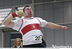 Winner Sean Breathnach of Galway City Harriers AC competing in the senior men&#039;s shot putt at the Irish Life Health National Senior Indoor Athletics Championships