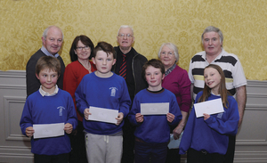 Killeen NS who finished in third place in group A of the Credit Union Chapter table quiz, which was held in the Great National Hotel in Ballina. Back row: Jimmy Murphy (Credit Union), Cathy Murtagh (Credit Union), Michael Gormley (Credit Union, Chapter Treasurer), Theresa Convey (Credit Union) and John Walsh (Credit Uniion). Front Row: Eoin Dyar, Matthew Kilcoyne, Cian O&#039;Malley and Lilly Dunwood.  Photo: John O&#039;Grady Photography.