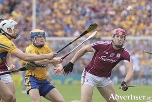 Galway&#039;s Jonathan Glynn is chased by Clare&#039;s S&eacute;adna Morey and Conor Cleary in the All Ireland Senior Hurling Championship semi-final at Simple Stadium on Sunday. Photo:-Mike Shaughnessy